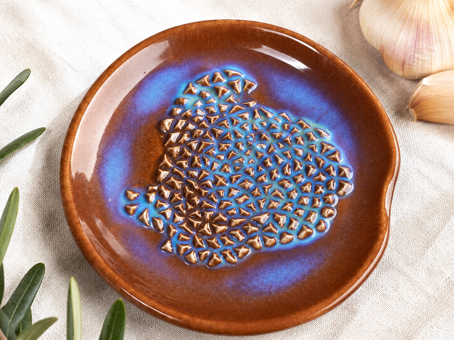 Handcrafted ceramic garlic grater in brown and blue